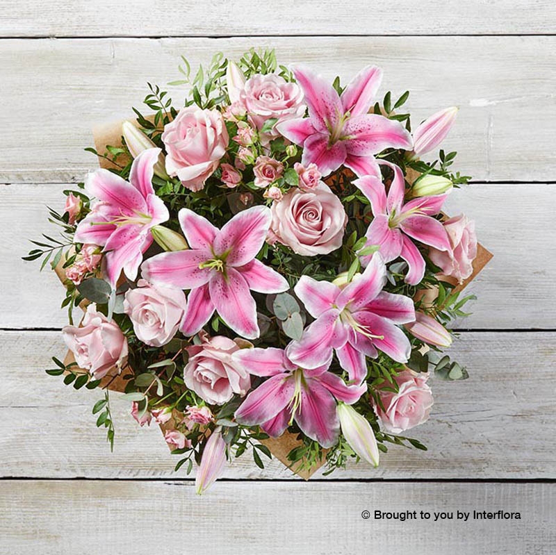 Pink Lily Pink Rose Pink Spray Rose & Greenery in a hand tied bouquet