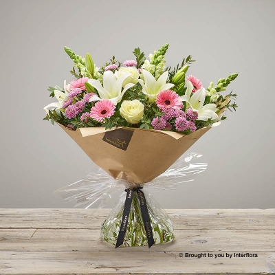 Pink Germini White Lily White Antirrhinum Pink Chrysanthemum Ivory Rose & greenery in hand tied bouquet