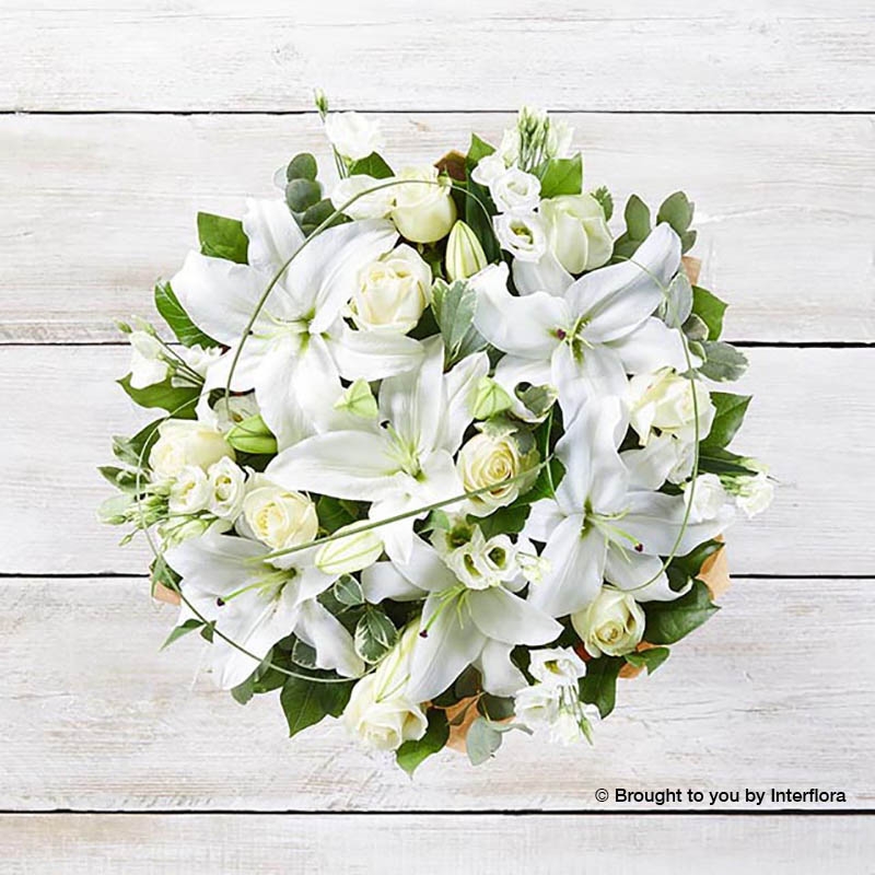 Ivory Rose White Lily White Lisianthus & greenery in a hand tied bouquet