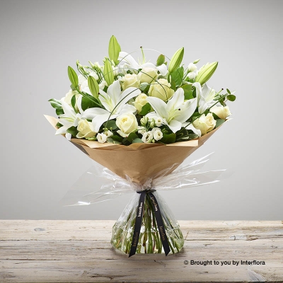 Ivory Rose White Lily White Lisianthus & greenery in a hand tied bouquet
