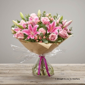 Pink Lily Pink Rose Pink Spray Rose & Greenery in a hand tied bouquet