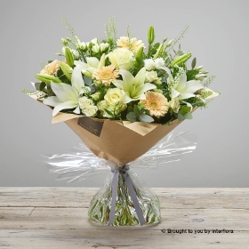 White Lisianthus White Spray Rose White Lily Ivory Rose Cream Germini & greenery in a hand tied bouquet