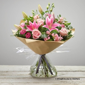 Pink Alstromeria Pink Lily Pink Lisianthus Pink Rose & greenery in a hand tied bouquet