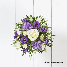 Purple Freesia Ivory Rose Purple Lisianthus White Spray Rose & Dried Lavender in lilac spot ceramic watering can
