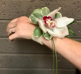 Debs Orchid Corsage on a Pearl Bracelet